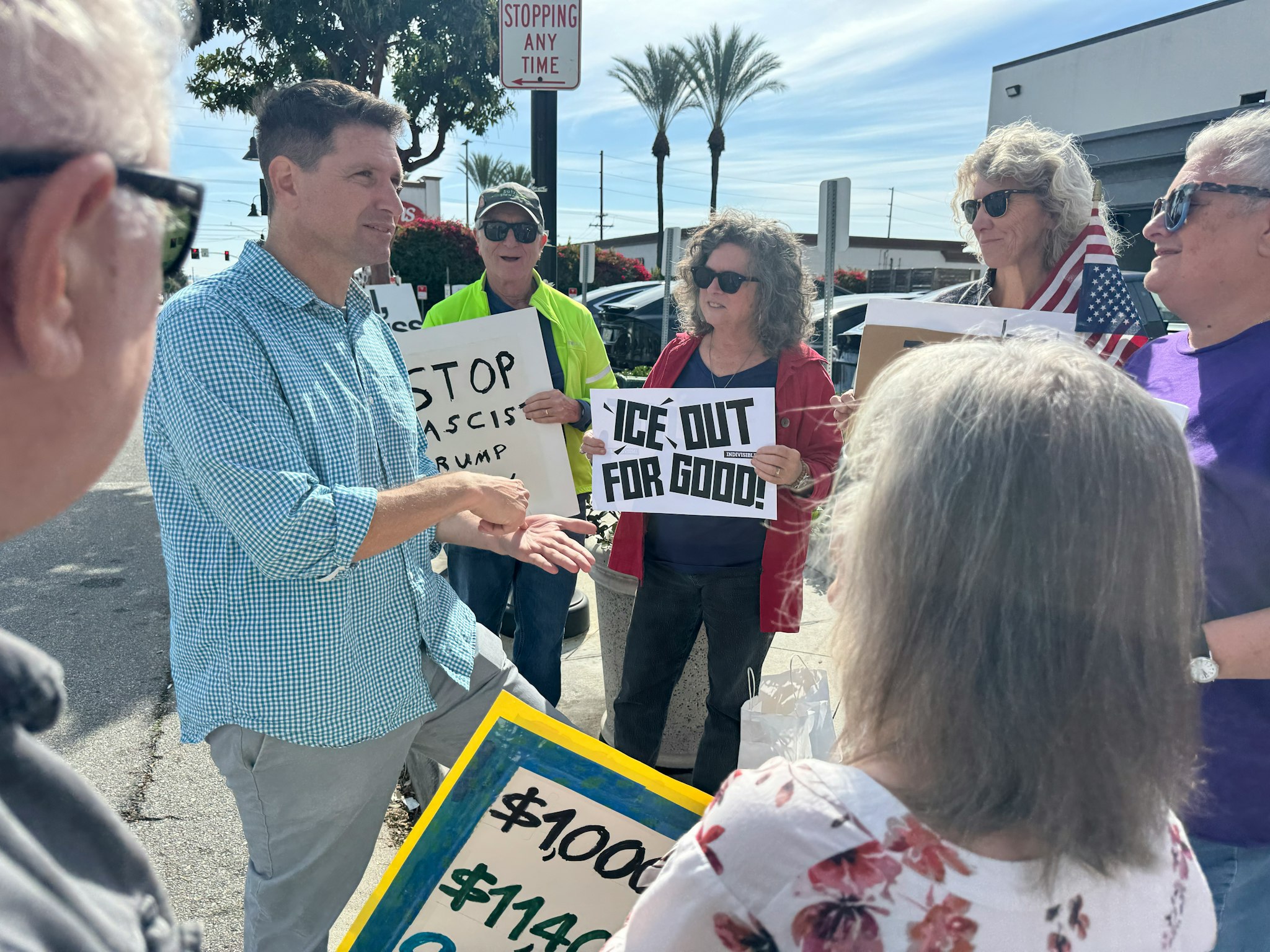 Joel at an ICE OUT community action